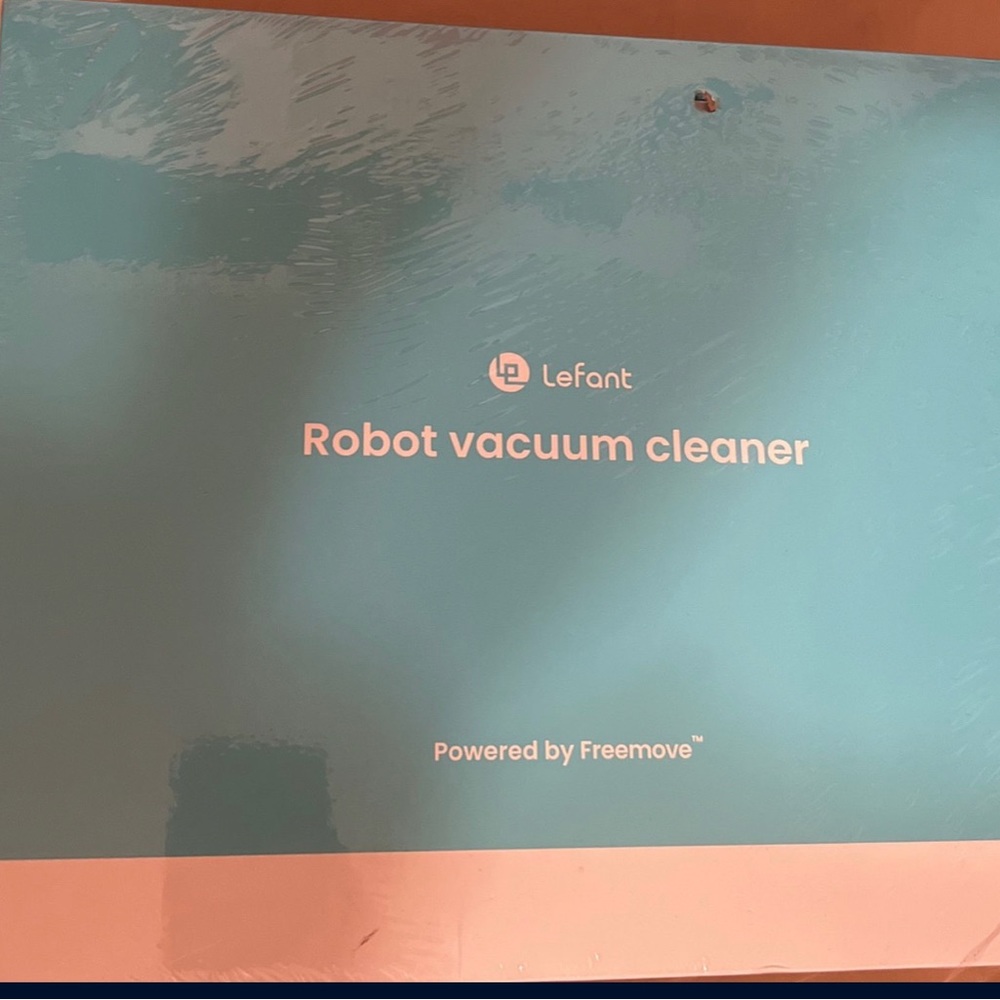 white lefant robot vacuum cleaner